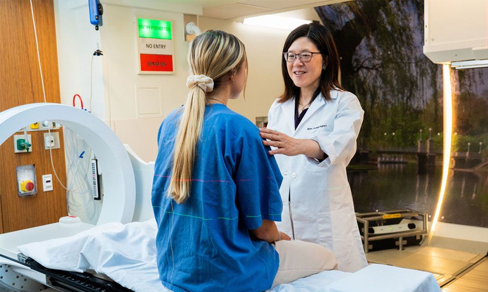 Helen Shih, MD with a proton therapy patient Helen Shih, MD with a proton therapy patient