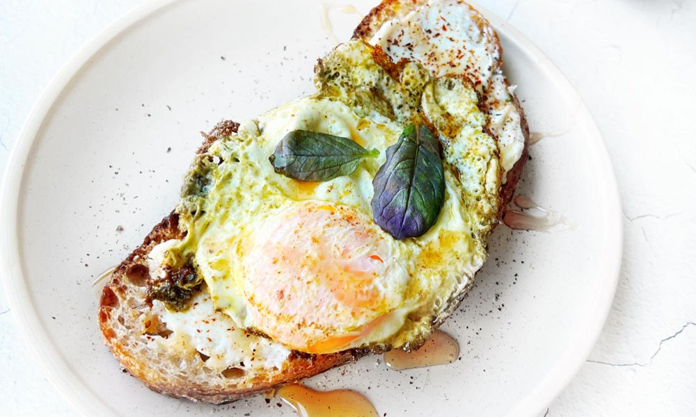 Pesto Fried Egg Over Sourdough Ricotta Toast Pesto Fried Egg Over Sourdough Ricotta Toast