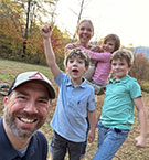 Theo with his family on a trip in Vermont in October 2024